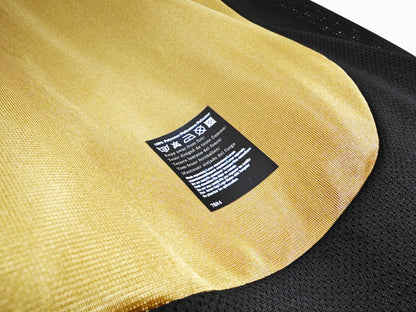 The 2001/02 Manchester United Reversible golden / white